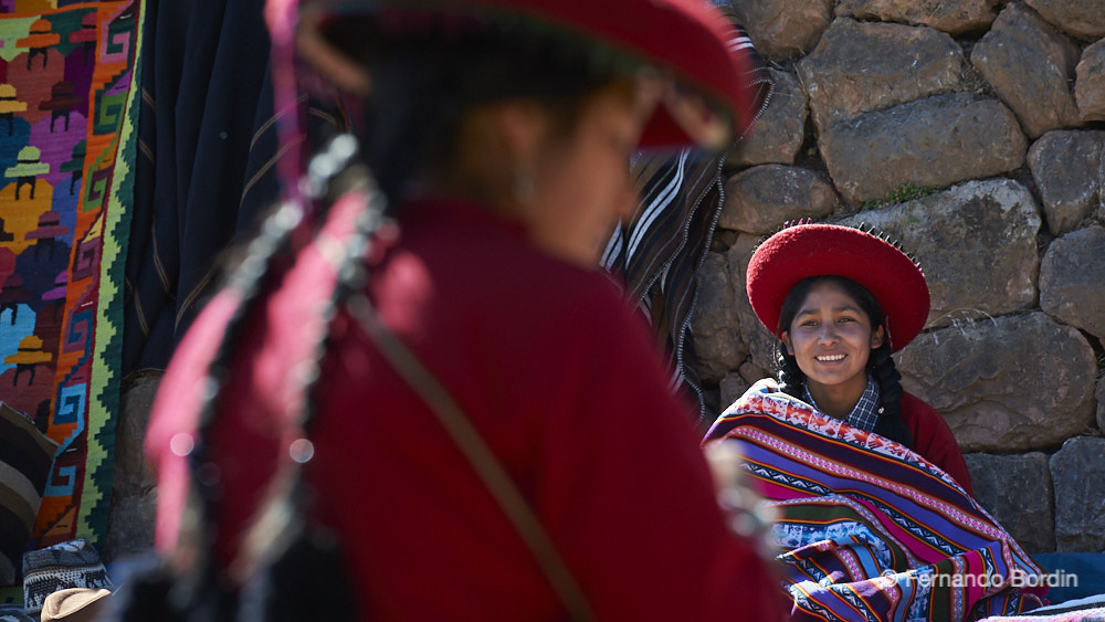 Chinchero, 30 km from Cusco, Peru, is a village that stands on the ruins of an ancient Inca settlement. 
A very colorful and full of life place that comes alive particularly during the Sunday market. 
On this day, the inhabitants of neighboring villages descend to the village wearing colorful traditional costumes, to sell goods of all kinds, from crafts to agricultural products. (2015)