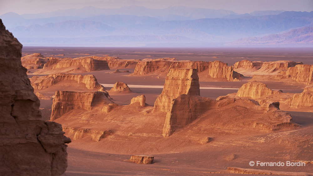 Persia, today's Iran, is a country known for its mythical cities and its millennial history, rather than for its natural beauty. 
Outside the classic tourist destinations, a journey through its immense plateau will allow us to appreciate some of its mostly unknown natural beauties. 
The rainbow mountains of the north, the Kaluts (sand castles) in the Lut desert and the wonder of the islands in the far south are just a few examples 
of the extraordinary beauty of a country waiting to be discovered. (2019)